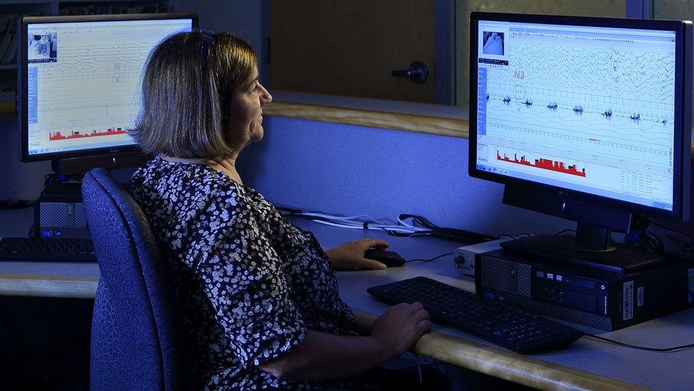 technician monitoring sleep study patient